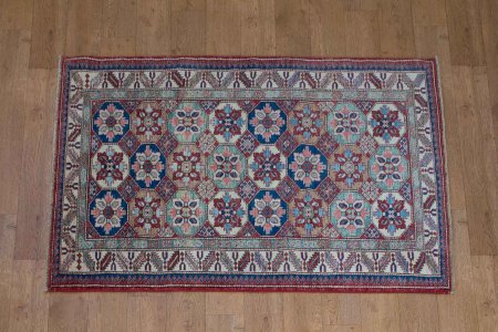 Hand-Knotted Kazak Rug From Afghanistan