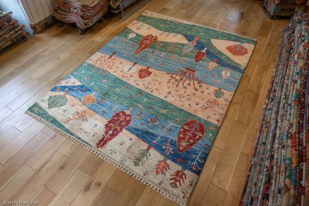 Hand-Knotted Khorjin Rug From Afghanistan