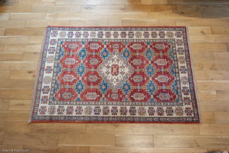 Hand-Knotted Kazak Rug From Afghanistan