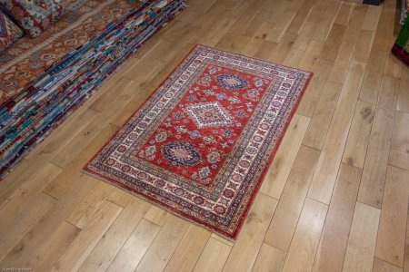 Hand-Knotted Kazak Rug From Afghanistan