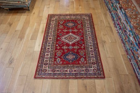 Hand-Knotted Kazak Rug From Afghanistan