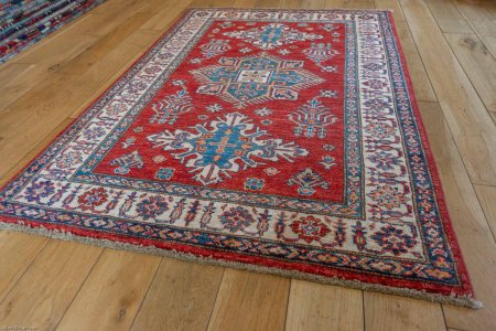 Hand-Knotted Kazak Rug From Afghanistan