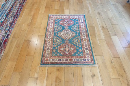 Hand-Knotted Kazak Rug From Afghanistan