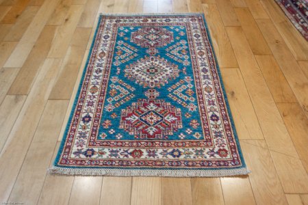 Hand-Knotted Kazak Rug From Afghanistan