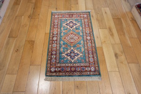 Hand-Knotted Fine Kazak Rug From Afghanistan