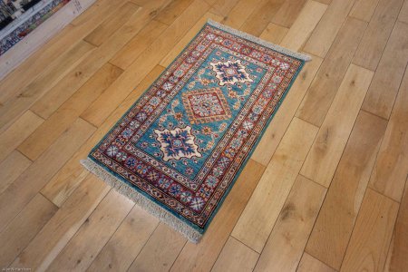 Hand-Knotted Fine Kazak Rug From Afghanistan