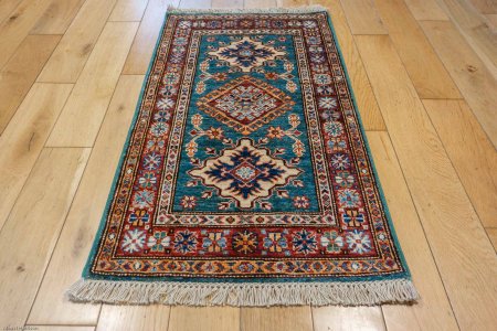 Hand-Knotted Fine Kazak Rug From Afghanistan