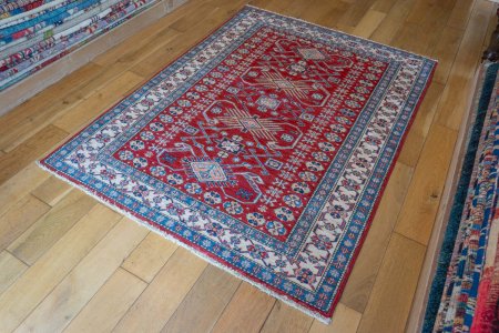 Hand-Knotted Kazak Rug From Afghanistan