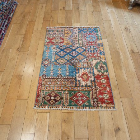 Hand-Knotted Khorjin Rug From Afghanistan